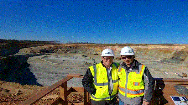 With CEO Mick Wilkes in front of the pit